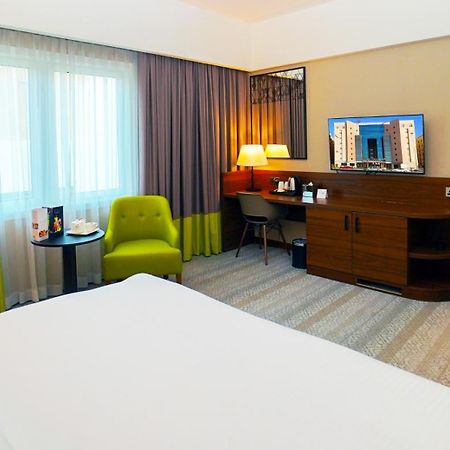 The Grand Lux Hotel Doha Dış mekan fotoğraf A room at the hotel