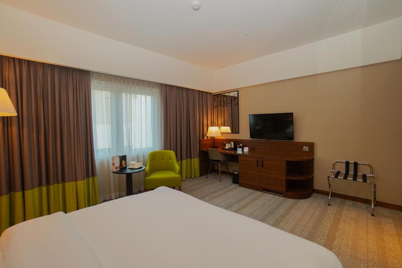 The Grand Lux Hotel Doha Dış mekan fotoğraf A room at the hotel