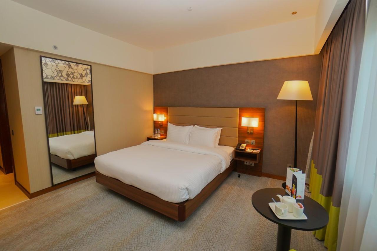 The Grand Lux Hotel Doha Dış mekan fotoğraf A room at the hotel