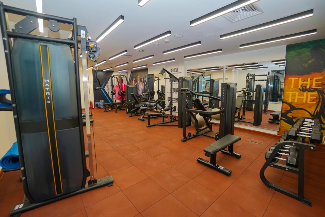 The Grand Lux Hotel Doha Dış mekan fotoğraf The gym at the hotel