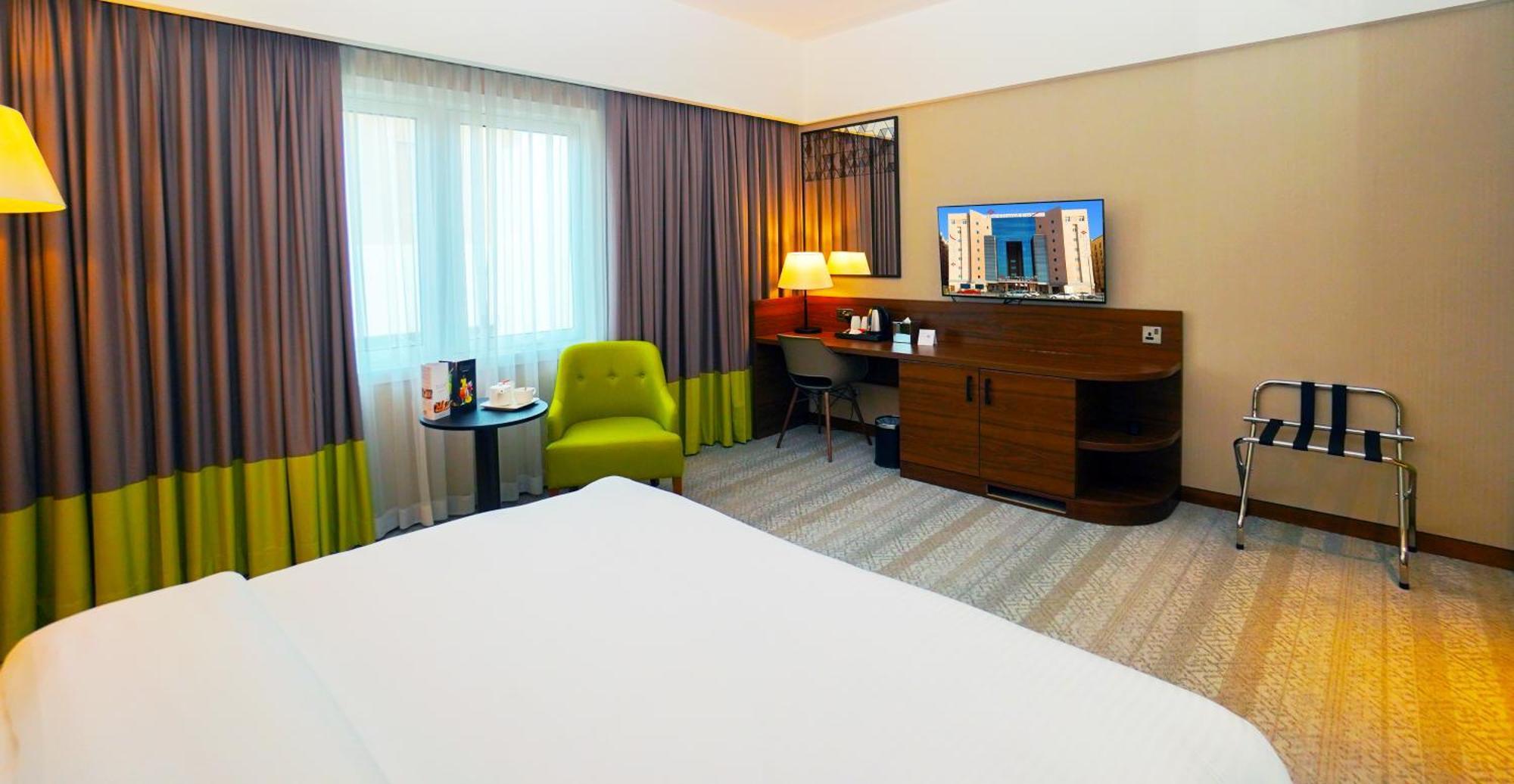 The Grand Lux Hotel Doha Dış mekan fotoğraf A room at the hotel
